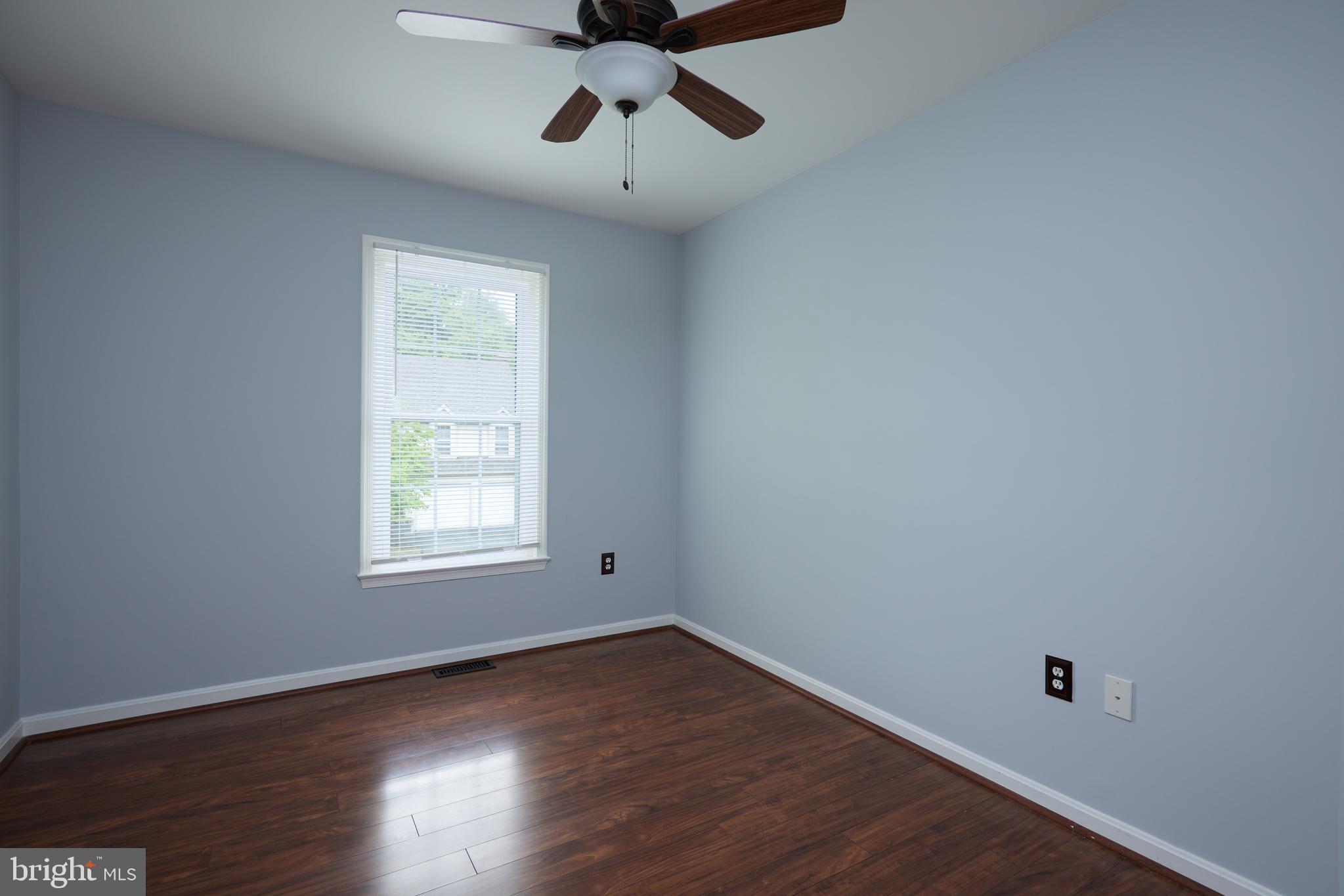 2723 Deer Ridge Drive Silver Spring, MD 20904 - Photo 28 of 45 wooden floor in an empty room with a window