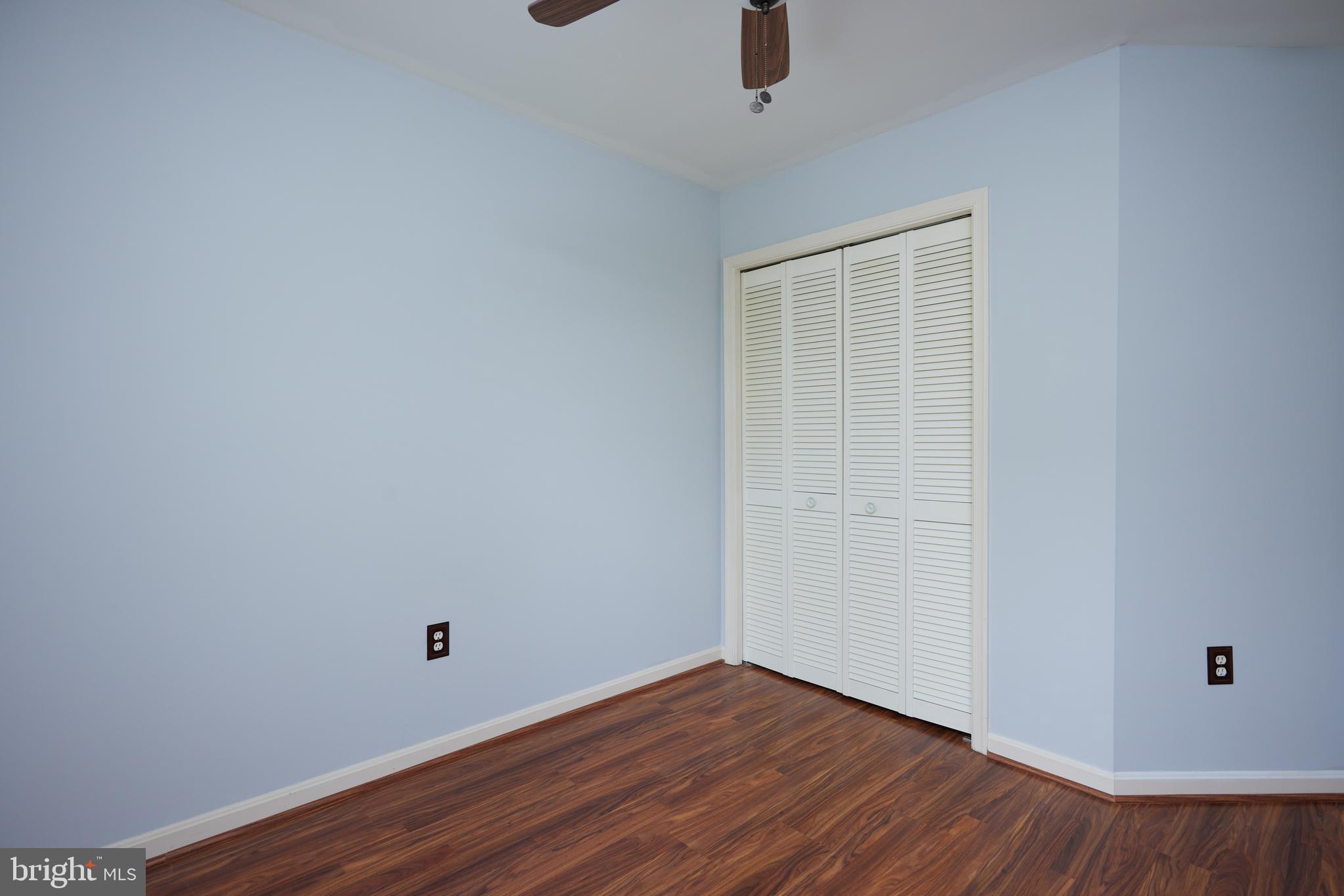 2723 Deer Ridge Drive Silver Spring, MD 20904 - Photo 31 of 45 a view of an empty room with wooden floor