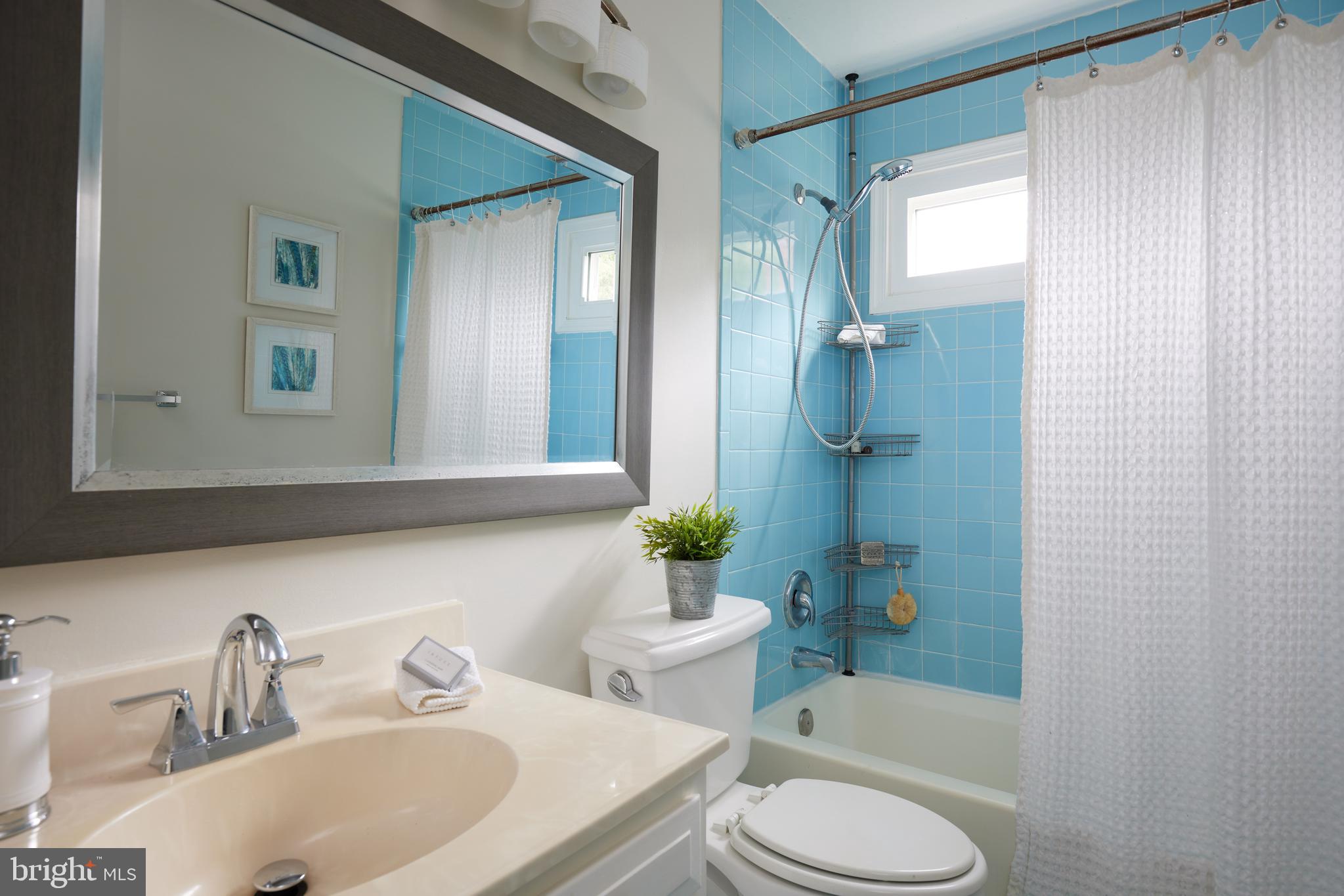2723 Deer Ridge Drive Silver Spring, MD 20904 - Photo 32 of 45 a bathroom with a sink toilet and shower