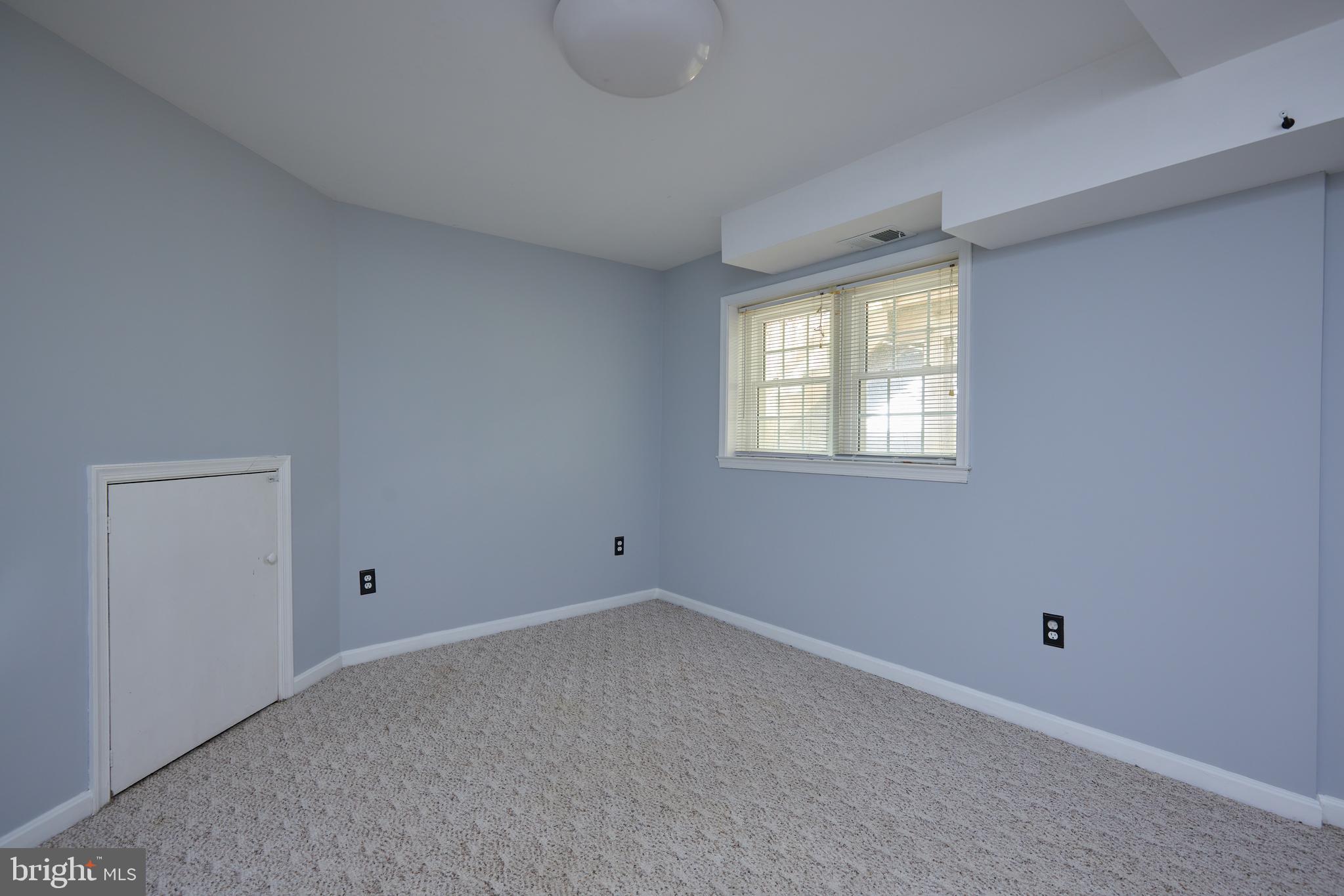 2723 Deer Ridge Drive Silver Spring, MD 20904 - Photo 38 of 45 a view of an empty room with a window