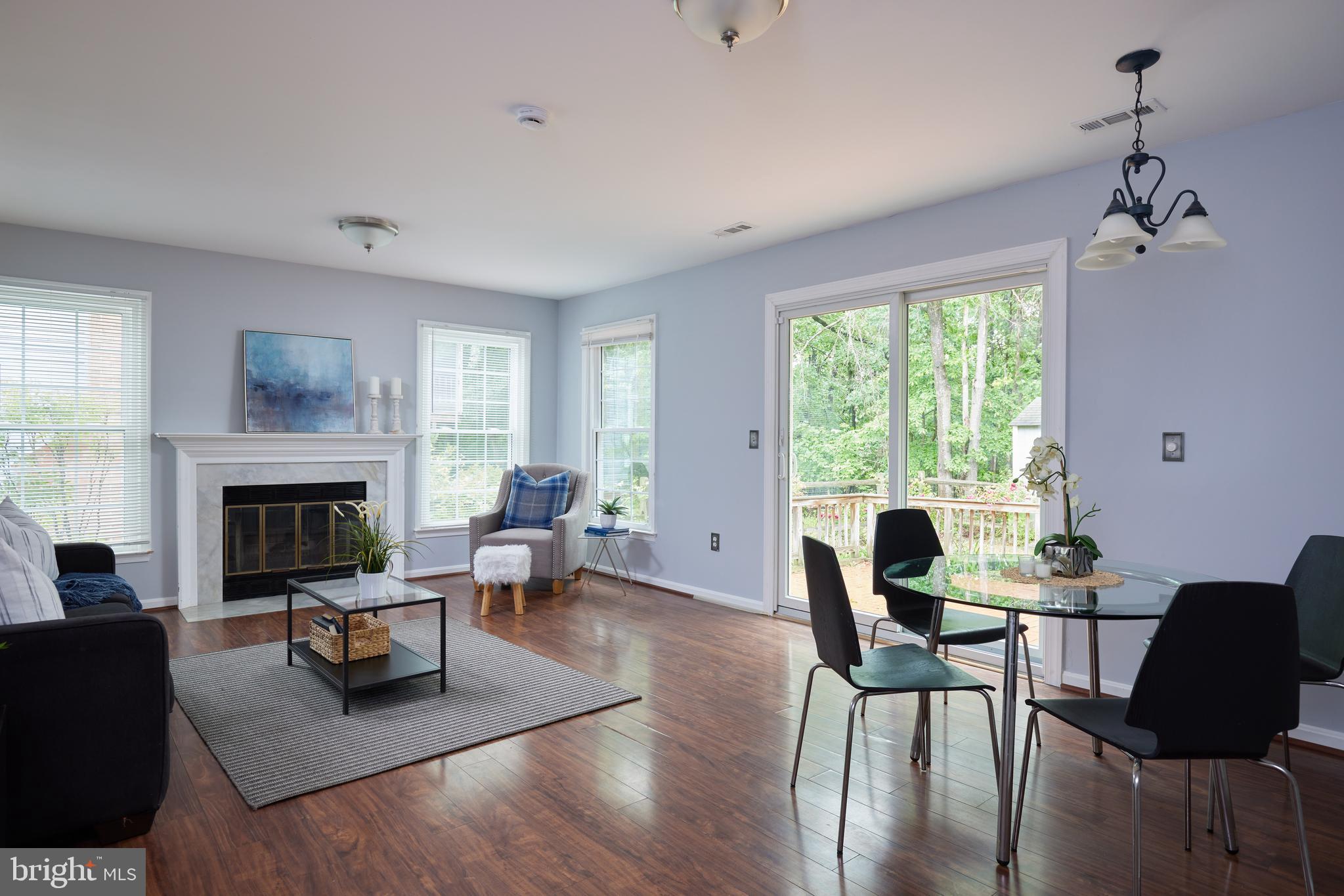 2723 Deer Ridge Drive Silver Spring, MD 20904 - Photo 5 of 45 a living room with furniture and a fireplace
