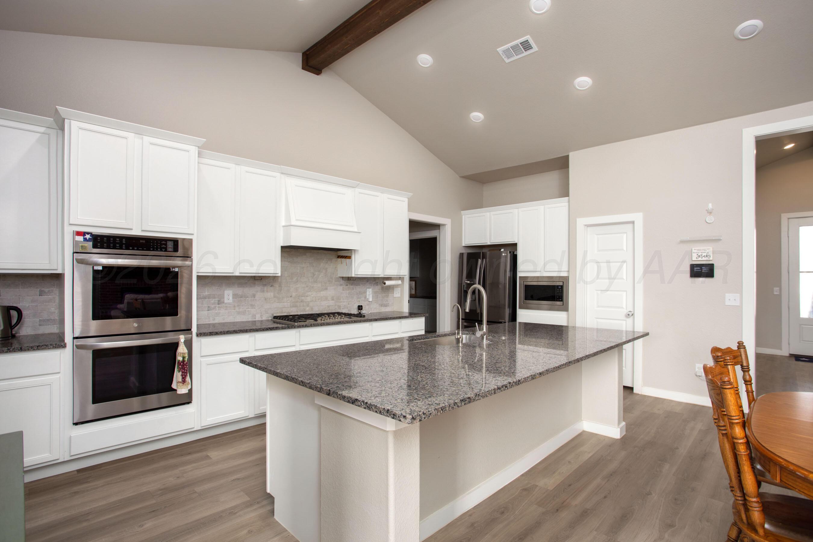 7509 Frazier Road Amarillo, TX 79119 - Photo 7 of 33 Kitchen Island