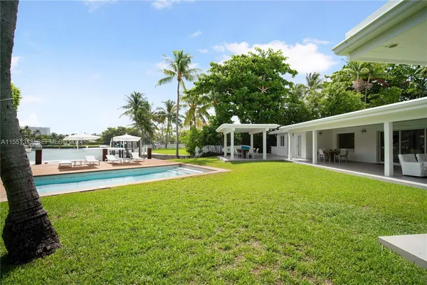 a view of outdoor space yard and swimming pool
