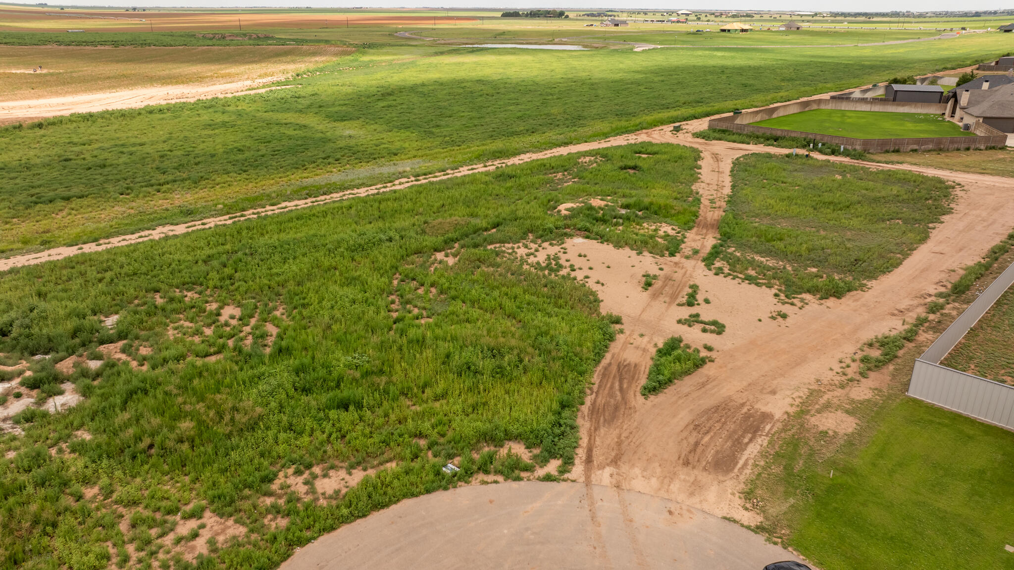 1038 Hawk Lane New Home, TX 79381 - Photo 2 of 6 a view of an ocean and a yard