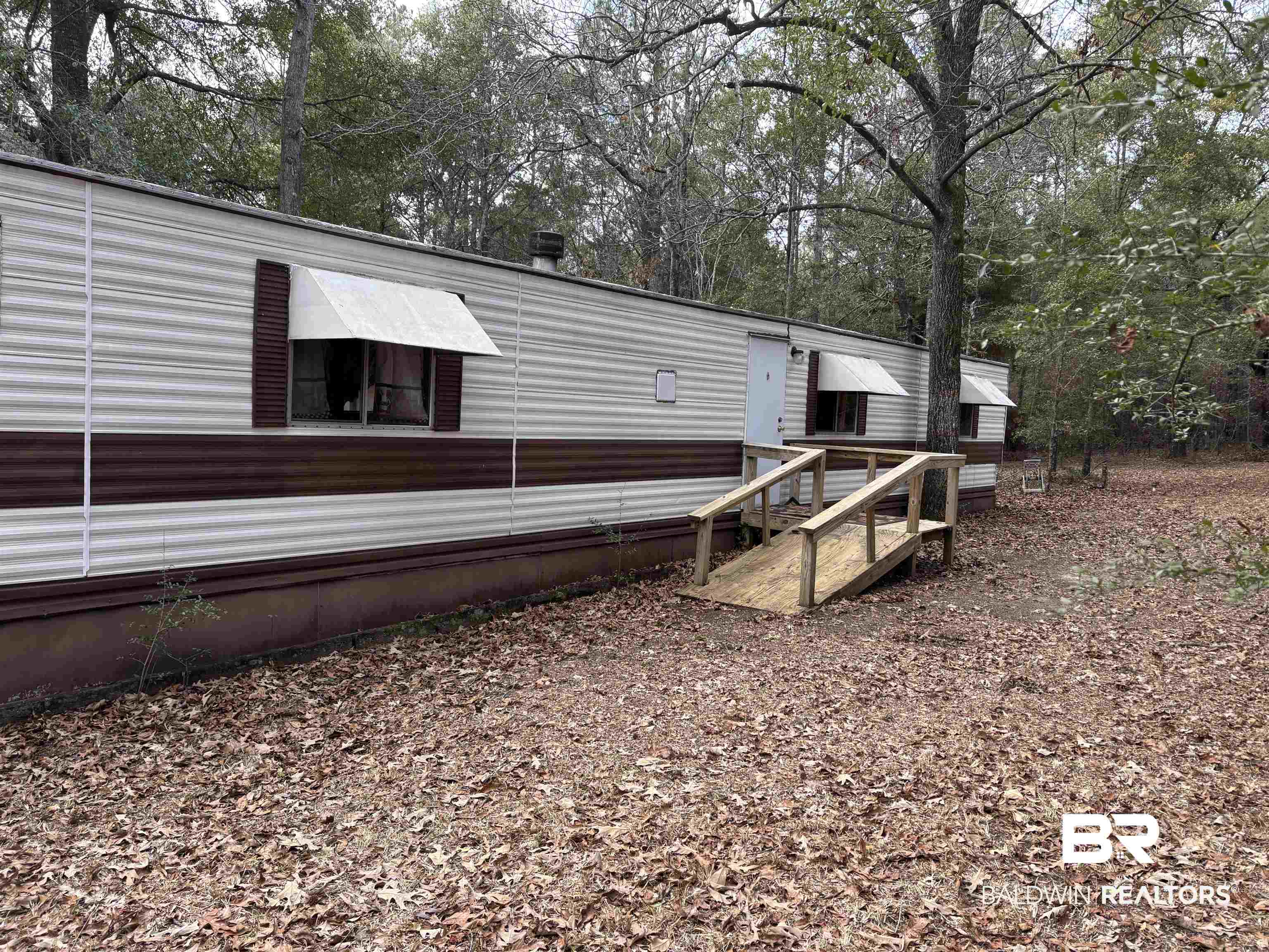 15575 Rogers Drive Chunchula, AL 36521 - Photo 1 of 42 View of rear view of property
