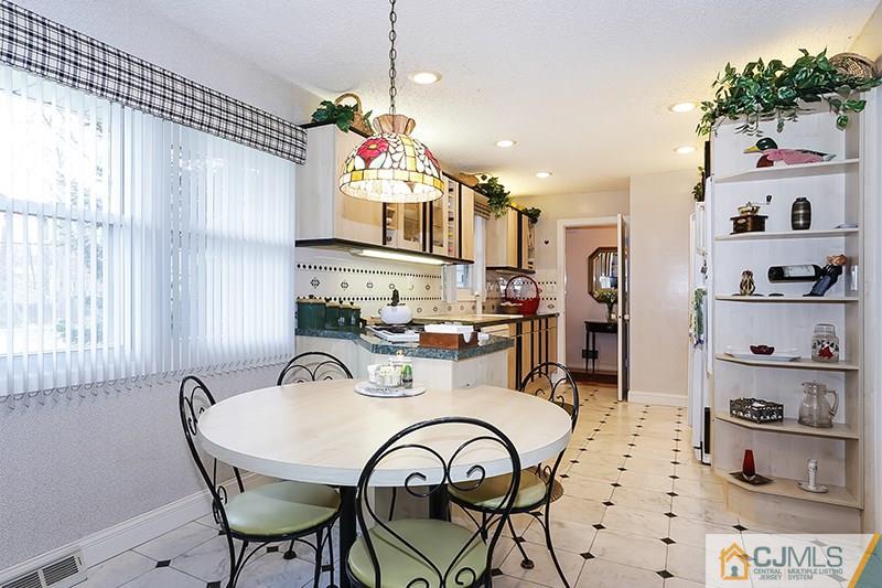 29 Nottingham Road Edison, NJ 08820 - Photo 4 of 18 a view of a dining room with furniture