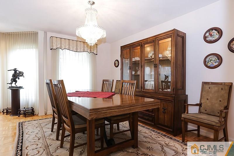 29 Nottingham Road Edison, NJ 08820 - Photo 7 of 18 a view of a dining room with furniture and window
