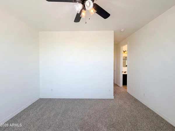 a view of a refrigerator in a room