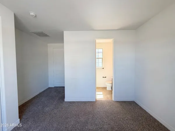 an empty room with a natural light