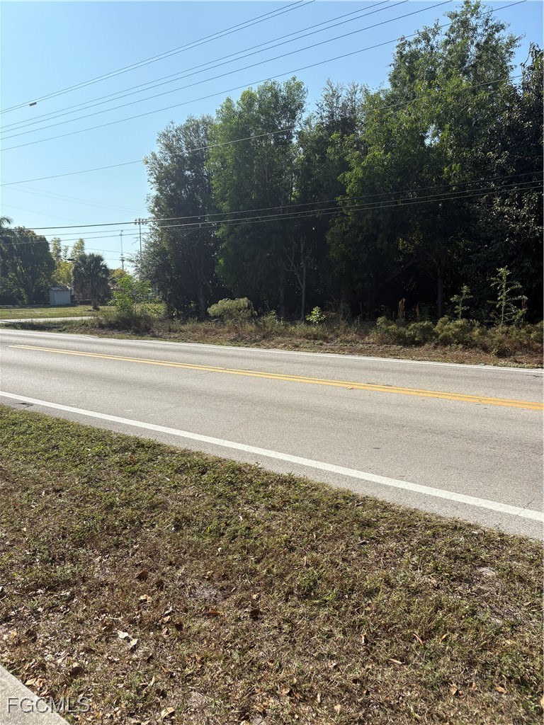 10641 Stringfellow Road Bokeelia, FL 33922 - Photo 3 of 4 a view of a yard