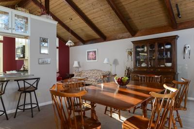 228 Huckins Neck Road Centerville, MA 02601 - Photo 9 of 19 a view of a dining room with furniture and window