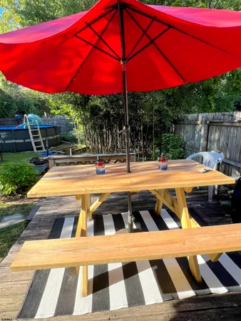 a view of outdoor space with swimming pool and patio