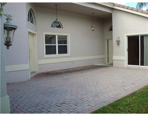 11030 Baybreeze Way Boca Raton, FL 33428 - Photo 9 of 11 an empty room with windows