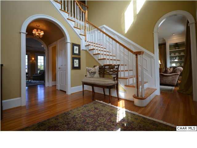 3072 Darby Road, Unit P2A 31 Keswick, VA 22947 - Photo 3 of 40 Feel a dash more suave & sophisticated as you enter through impressive double solid wood doors. Here is a luxurious atmosphere that welcomes & elevates rather than overwhelms.