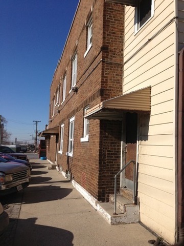 6021 South Archer Road Summit, IL 60501 - Photo 3 of 3 a front view of a house with stairs