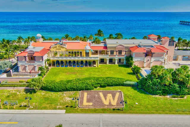 an aerial view of a house with a garden