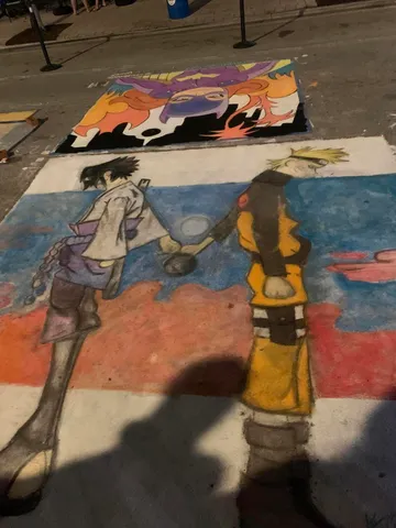 a view of a swimming pool with chairs