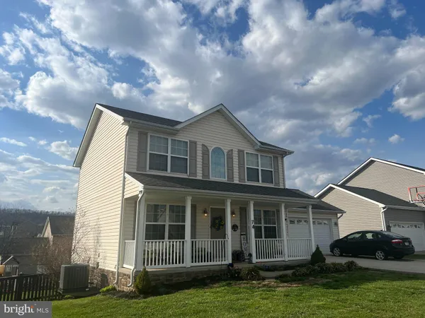 a view of a house with a garden