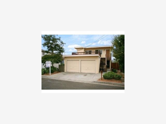 4550 Opal Street Capitola, CA 95010 - Photo 1 of 8 a picture of a person on a street