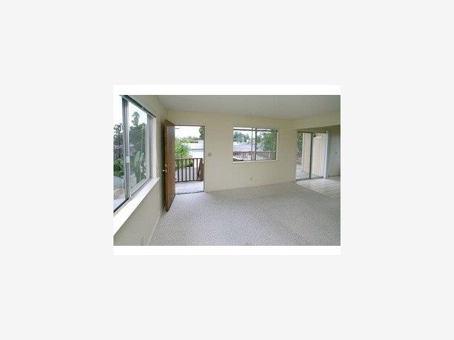 4550 Opal Street Capitola, CA 95010 - Photo 5 of 8 a picture of a living room with a window