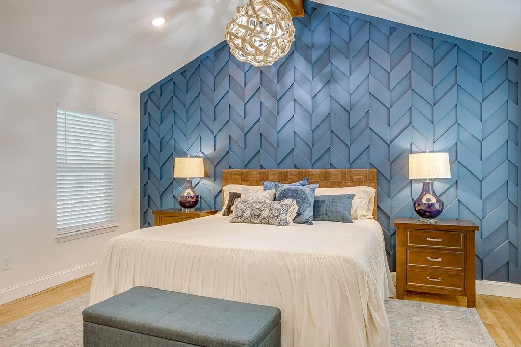 508 South Elm Street Weatherford, TX 76086 - Photo 18 of 40 a bedroom with a bed and a couch