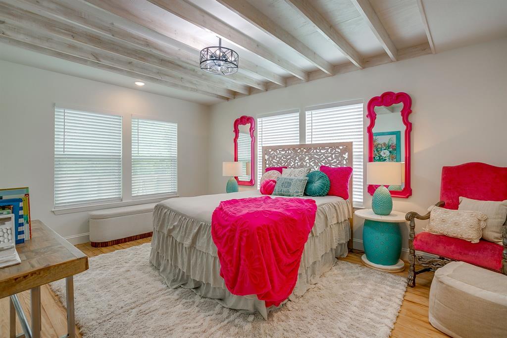 508 South Elm Street Weatherford, TX 76086 - Photo 23 of 40 a bedroom with bed and window