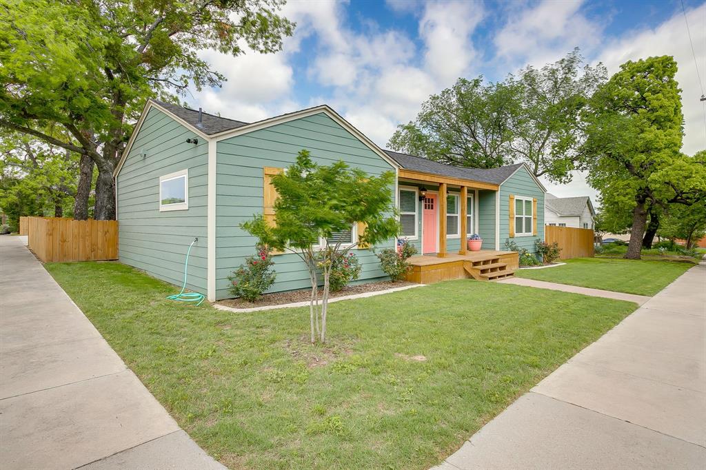 508 South Elm Street Weatherford, TX 76086 - Photo 37 of 40 a view of a house with a yard and tree s