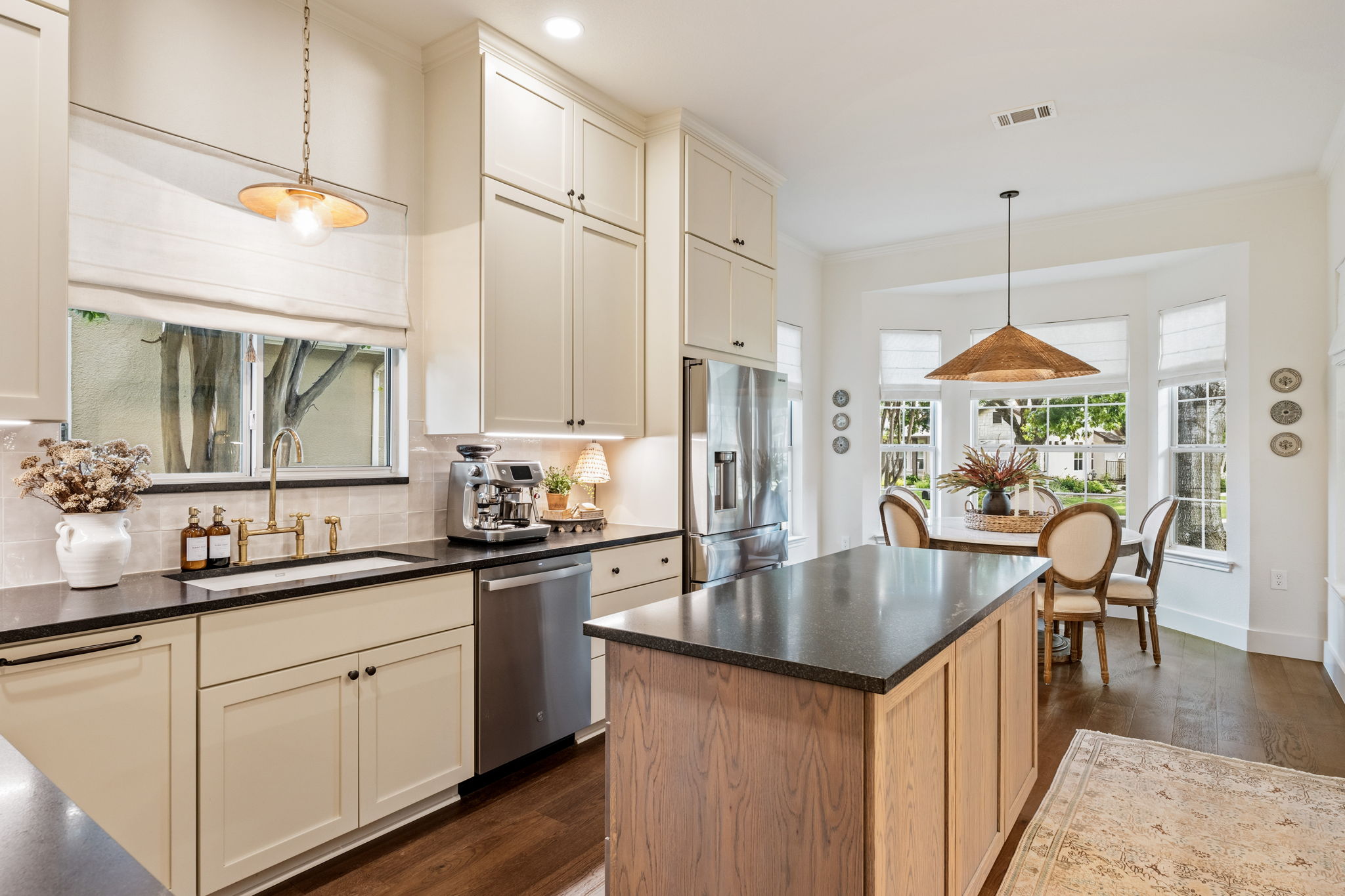 118 Cold Springs Drive Georgetown, TX 78633 - Photo 15 of 40 A well-appointed kitchen features a central island, modern appliances, and a bright breakfast nook with ample natural light.