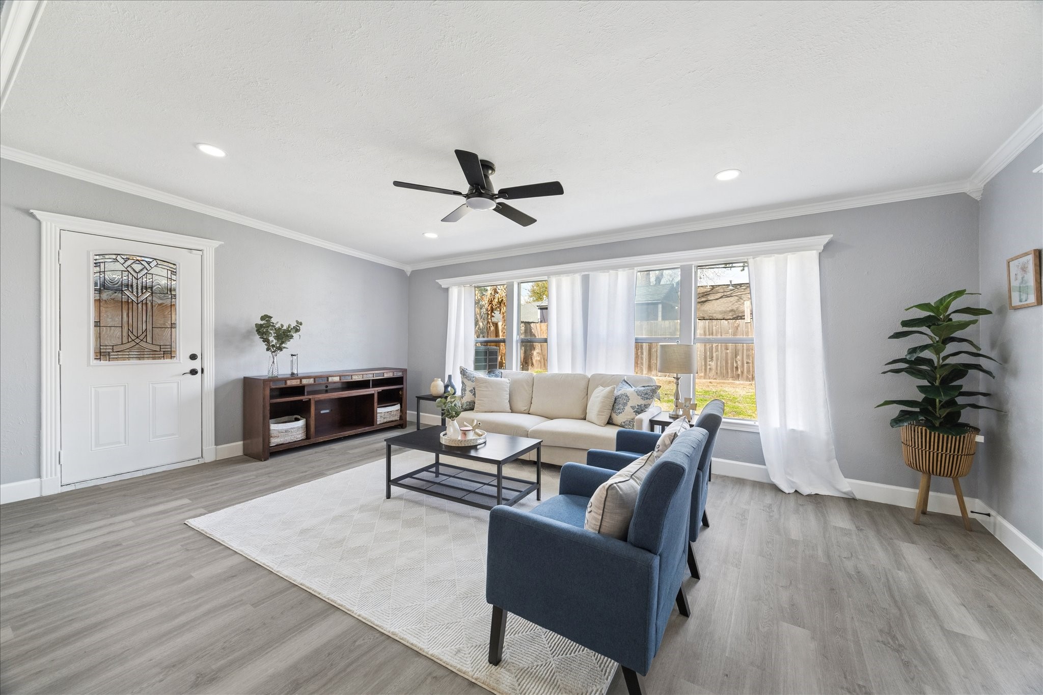 143 Mill Stream Lane Houston, TX 77060 - Photo 11 of 20 a living room with furniture and wooden floor