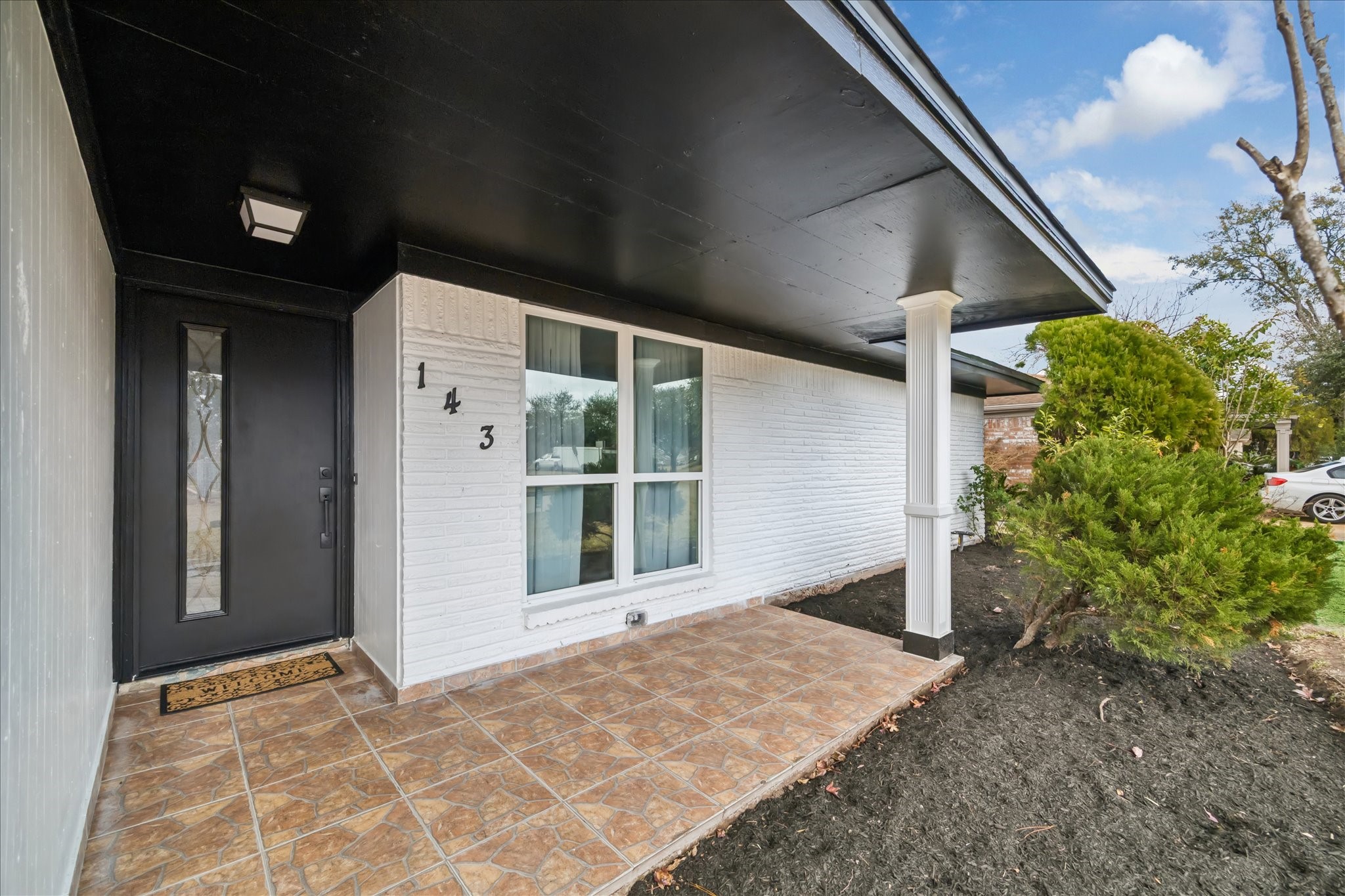 143 Mill Stream Lane Houston, TX 77060 - Photo 6 of 20 a front view of a house with a yard