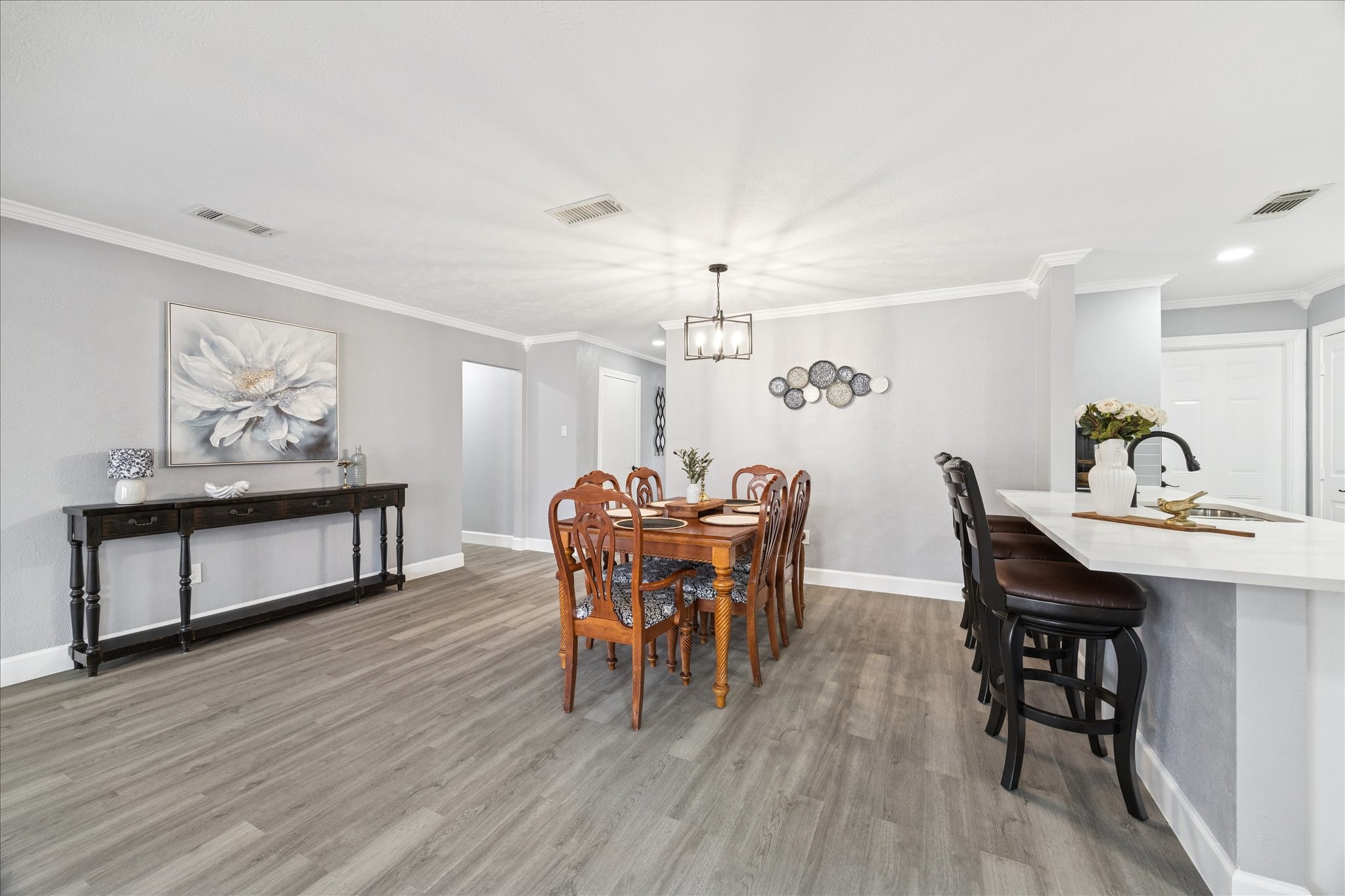 143 Mill Stream Lane Houston, TX 77060 - Photo 10 of 20 a view of a dining room with furniture and wooden floor