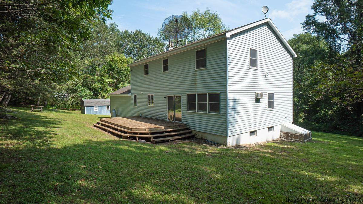 520 Plutarch Road New Paltz, NY 12561 - Photo 24 of 28 a front view of a house with a yard
