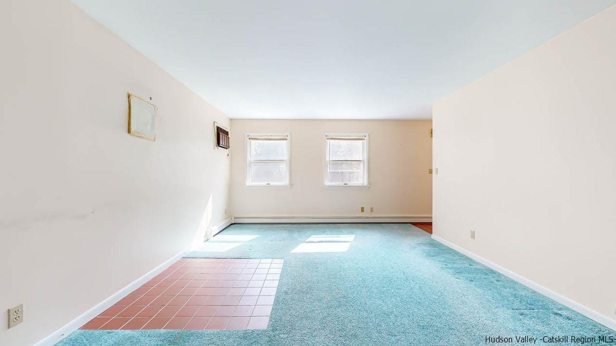 520 Plutarch Road New Paltz, NY 12561 - Photo 5 of 28 an empty room with windows