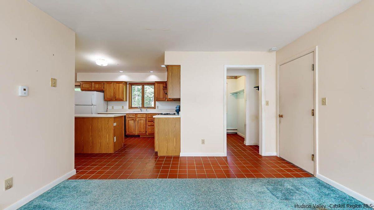 520 Plutarch Road New Paltz, NY 12561 - Photo 8 of 28 a view of kitchen with furniture and wooden floor