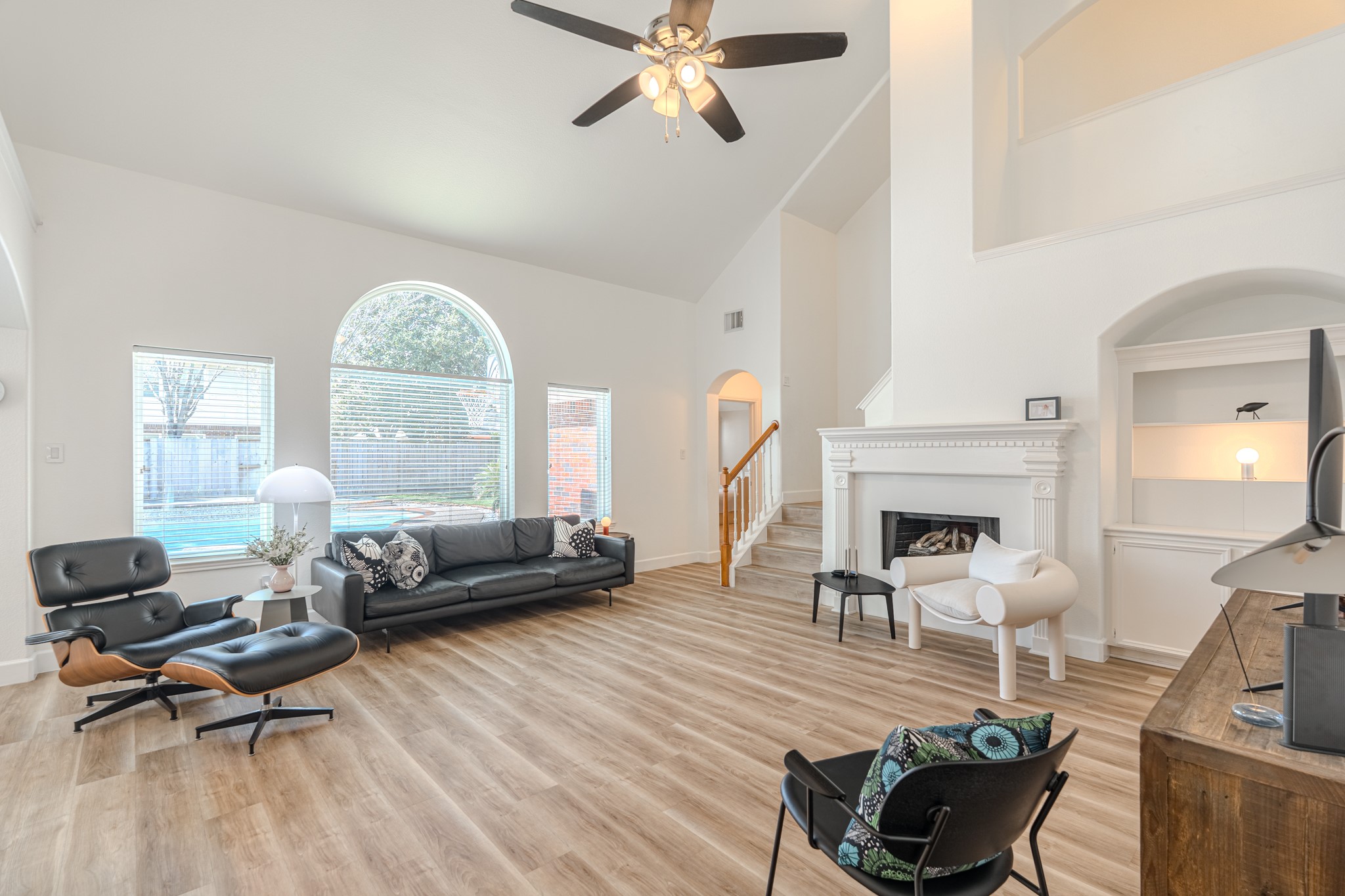 1107 Compass Cove Circle Spring, TX 77379 - Photo 11 of 42 a living room with furniture fireplace and a large window