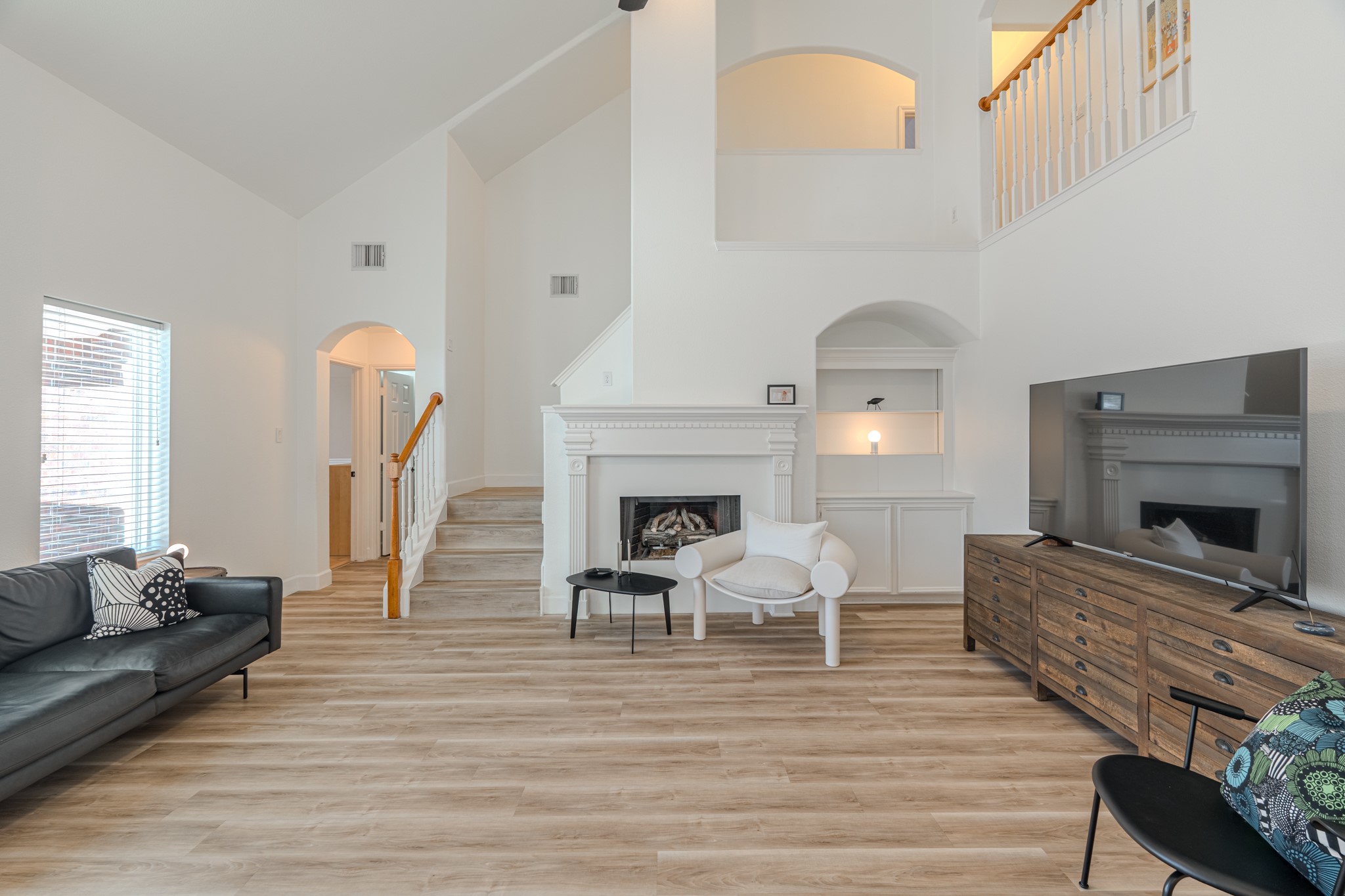 1107 Compass Cove Circle Spring, TX 77379 - Photo 12 of 42 a living room with furniture and a fireplace