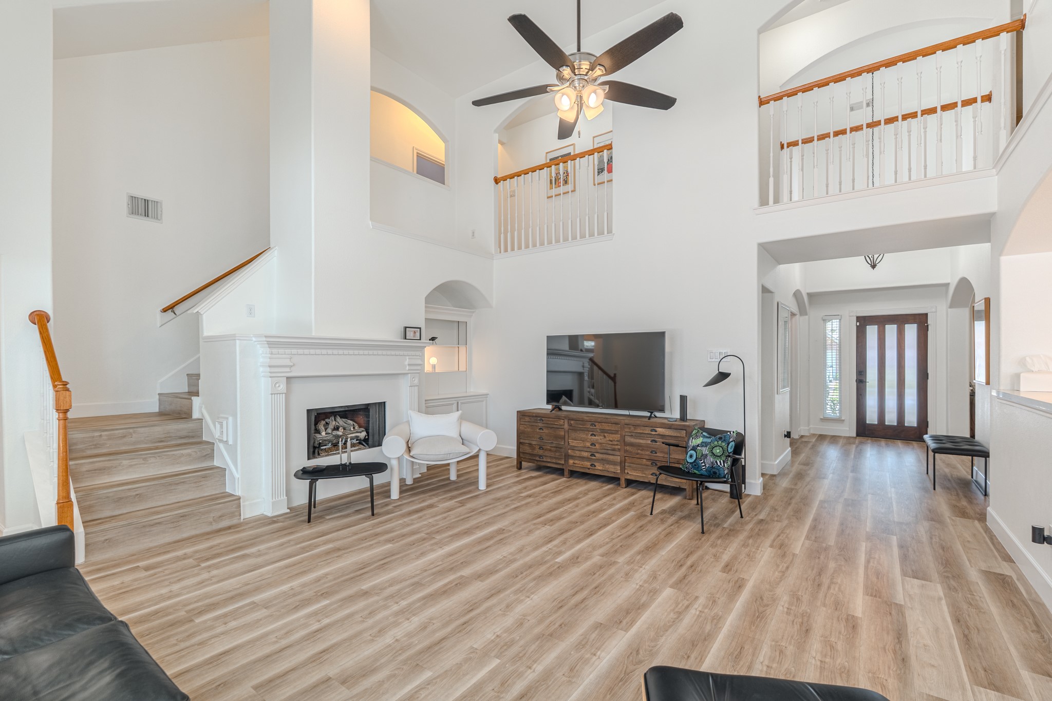 1107 Compass Cove Circle Spring, TX 77379 - Photo 13 of 42 a living room with furniture and a fireplace