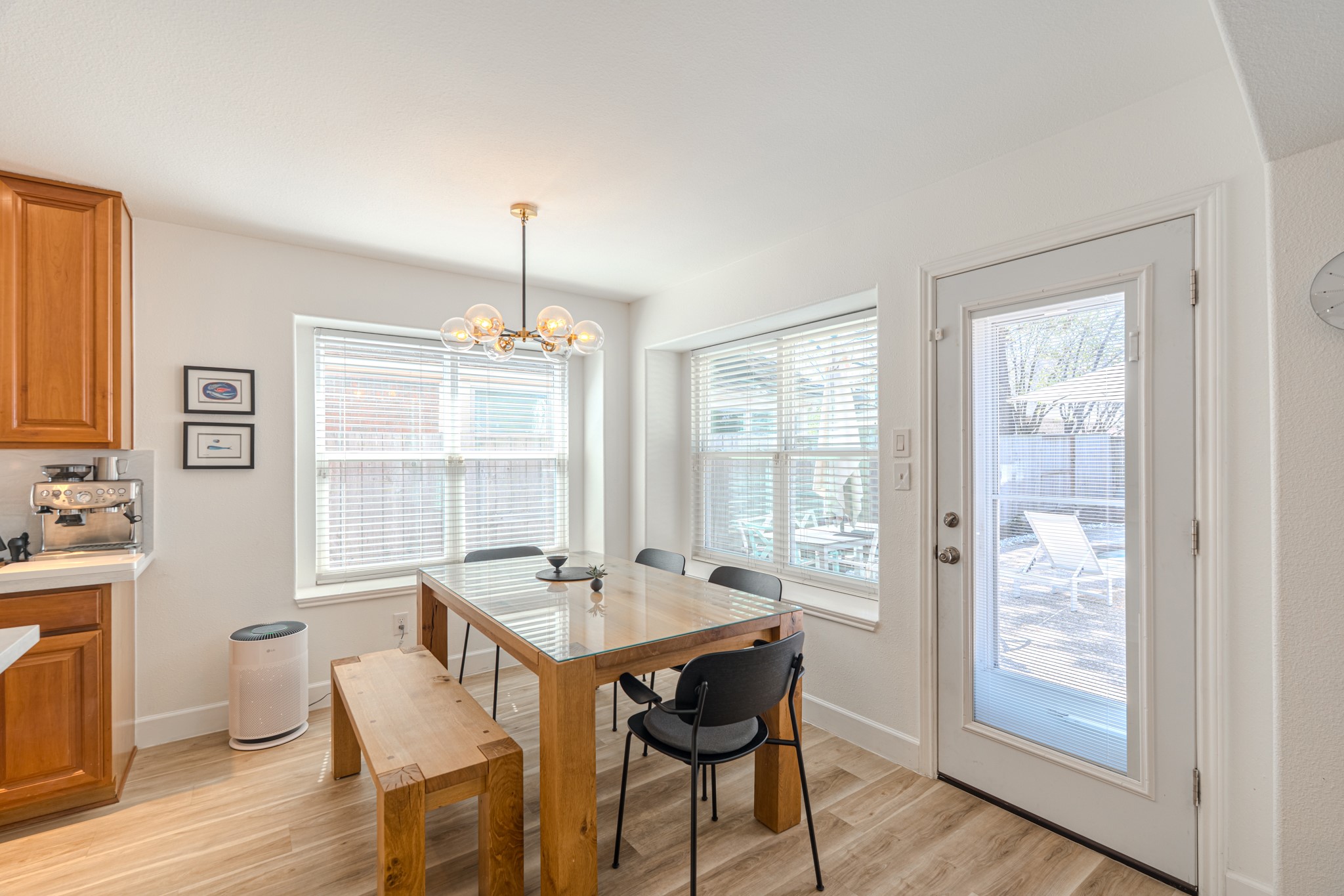 1107 Compass Cove Circle Spring, TX 77379 - Photo 19 of 42 a view of a dining room with furniture window and wooden floor