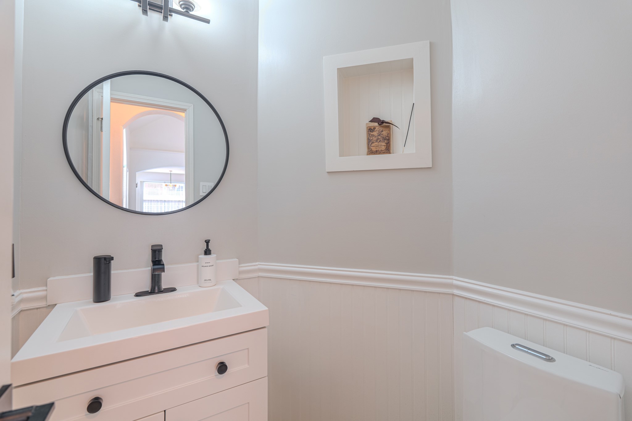 1107 Compass Cove Circle Spring, TX 77379 - Photo 26 of 42 a bathroom with a sink and a mirror