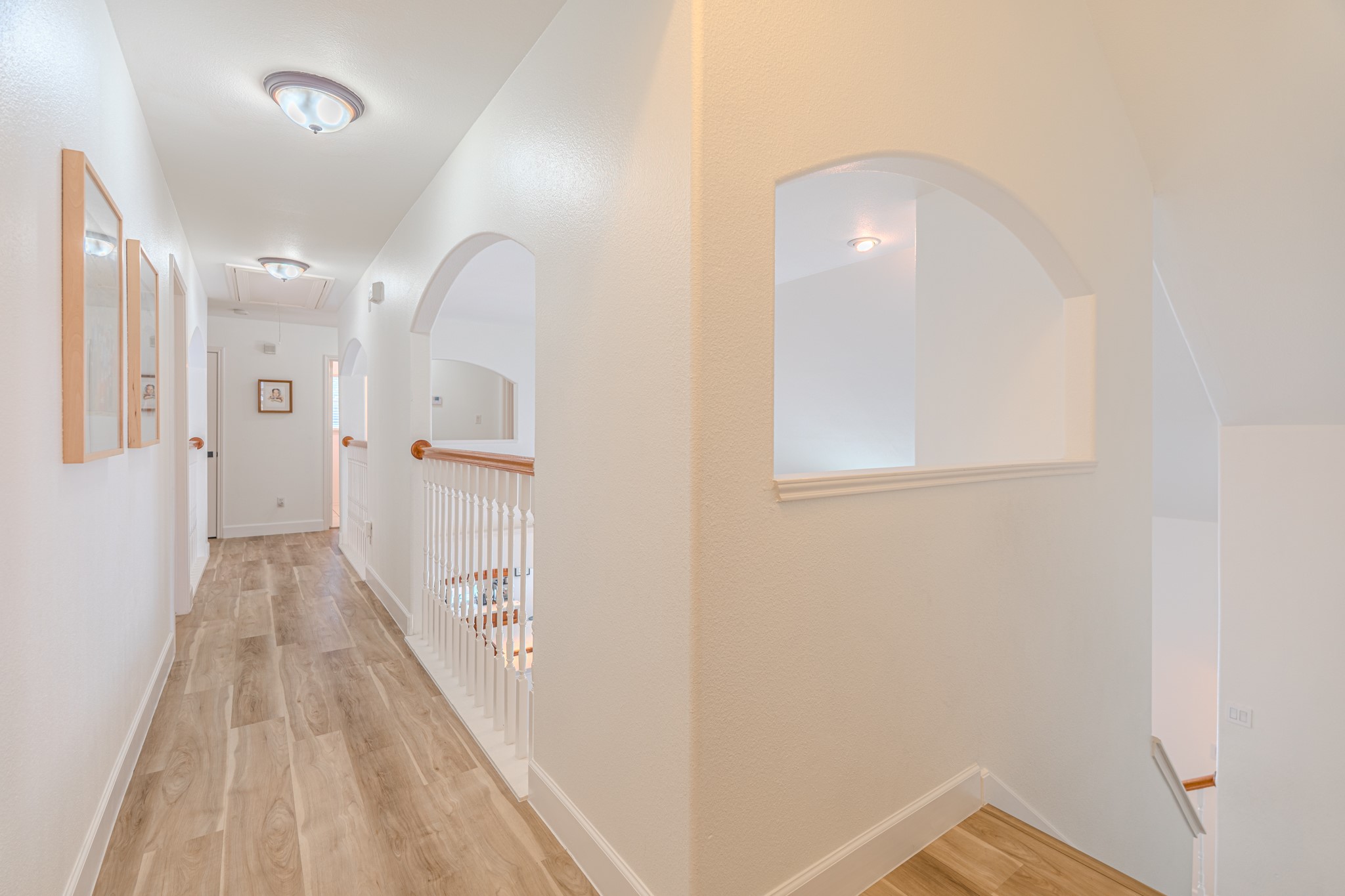 1107 Compass Cove Circle Spring, TX 77379 - Photo 28 of 42 a view of a hallway with wooden floor
