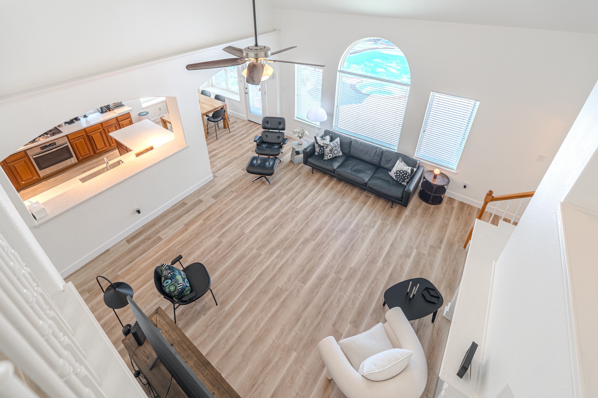 1107 Compass Cove Circle Spring, TX 77379 - Photo 31 of 42 a living room with furniture and a wooden floor