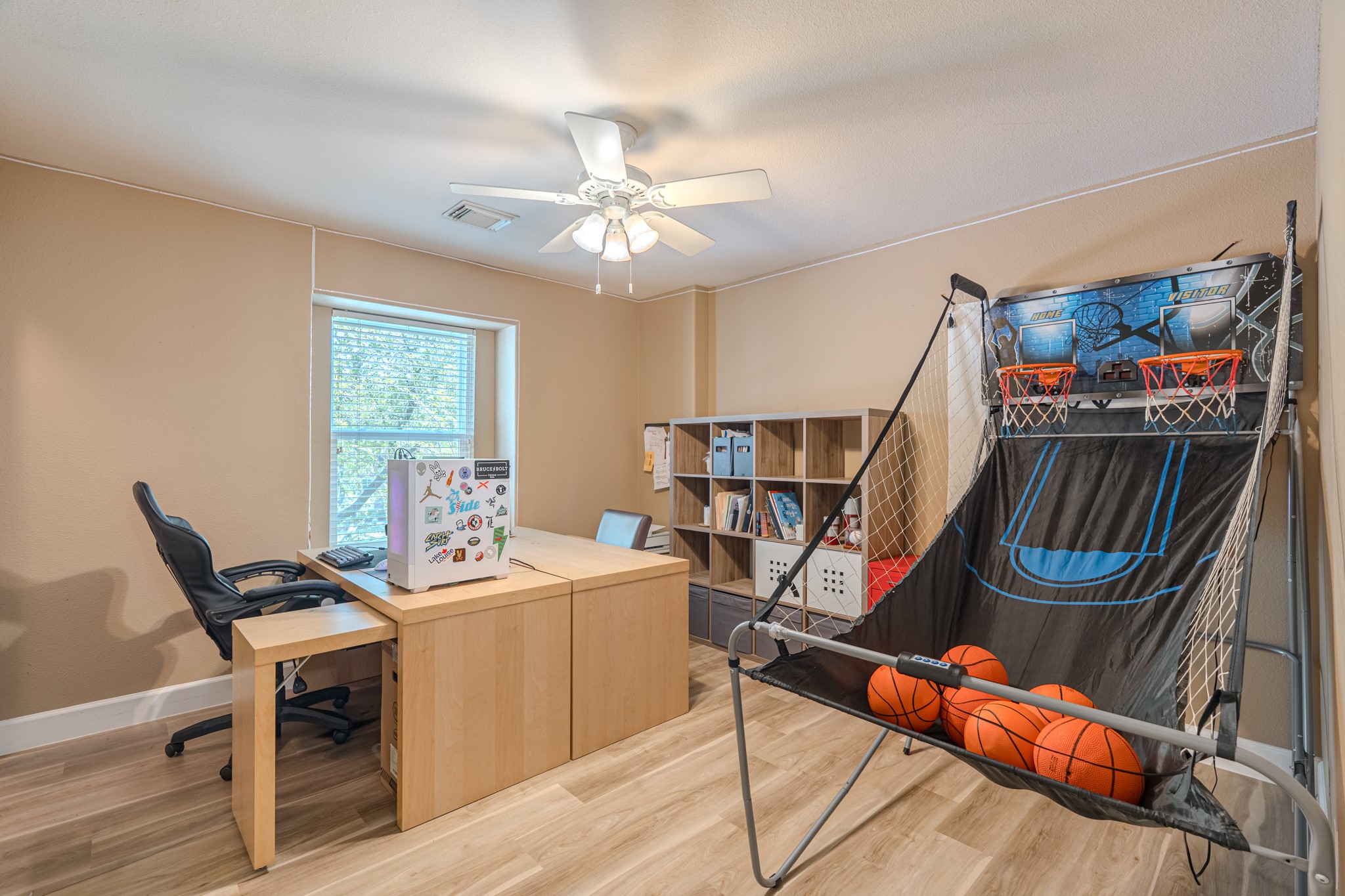 1107 Compass Cove Circle Spring, TX 77379 - Photo 34 of 42 a room with furniture and a chandelier
