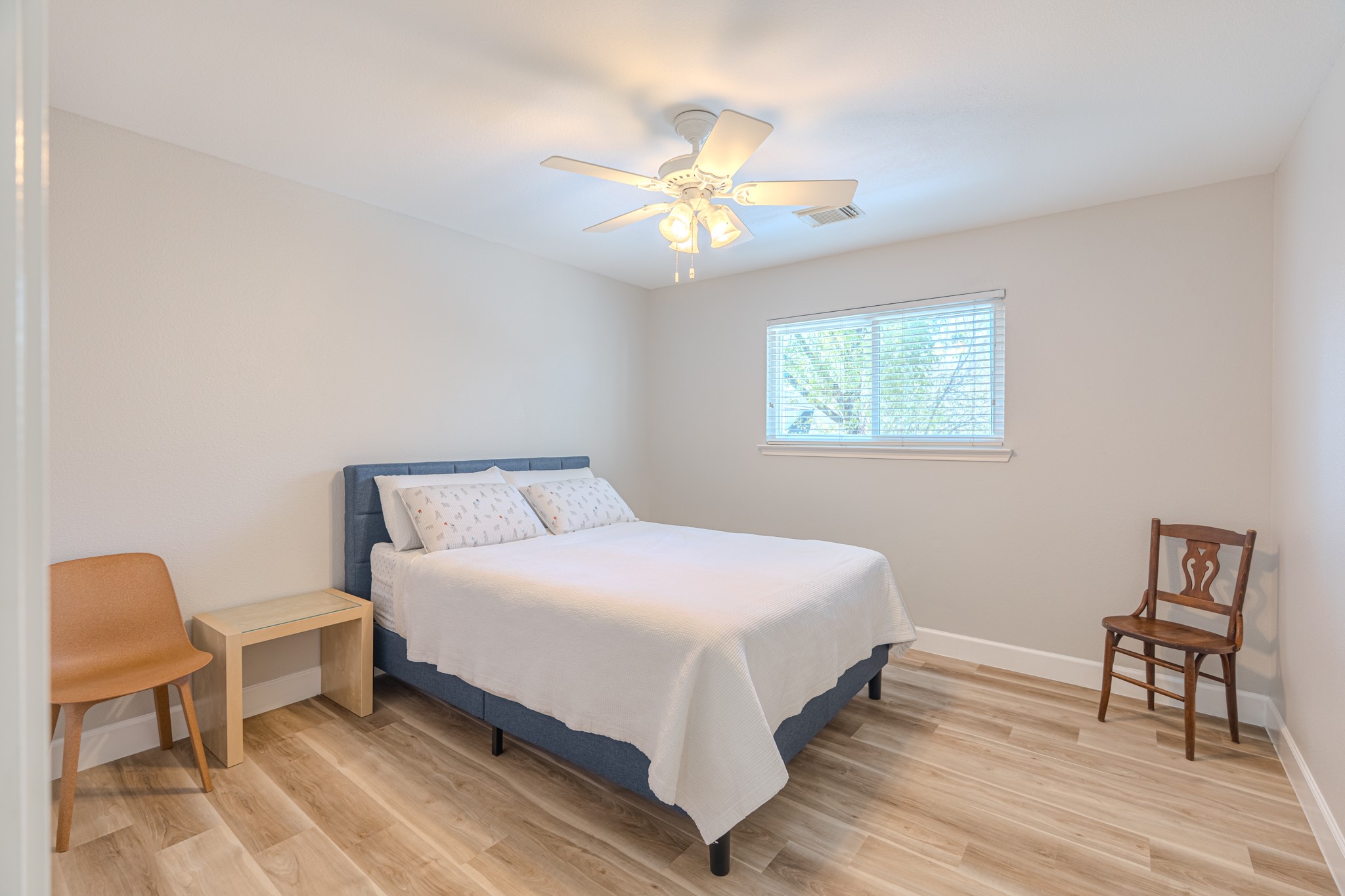 1107 Compass Cove Circle Spring, TX 77379 - Photo 37 of 42 a bedroom with a bed and a table