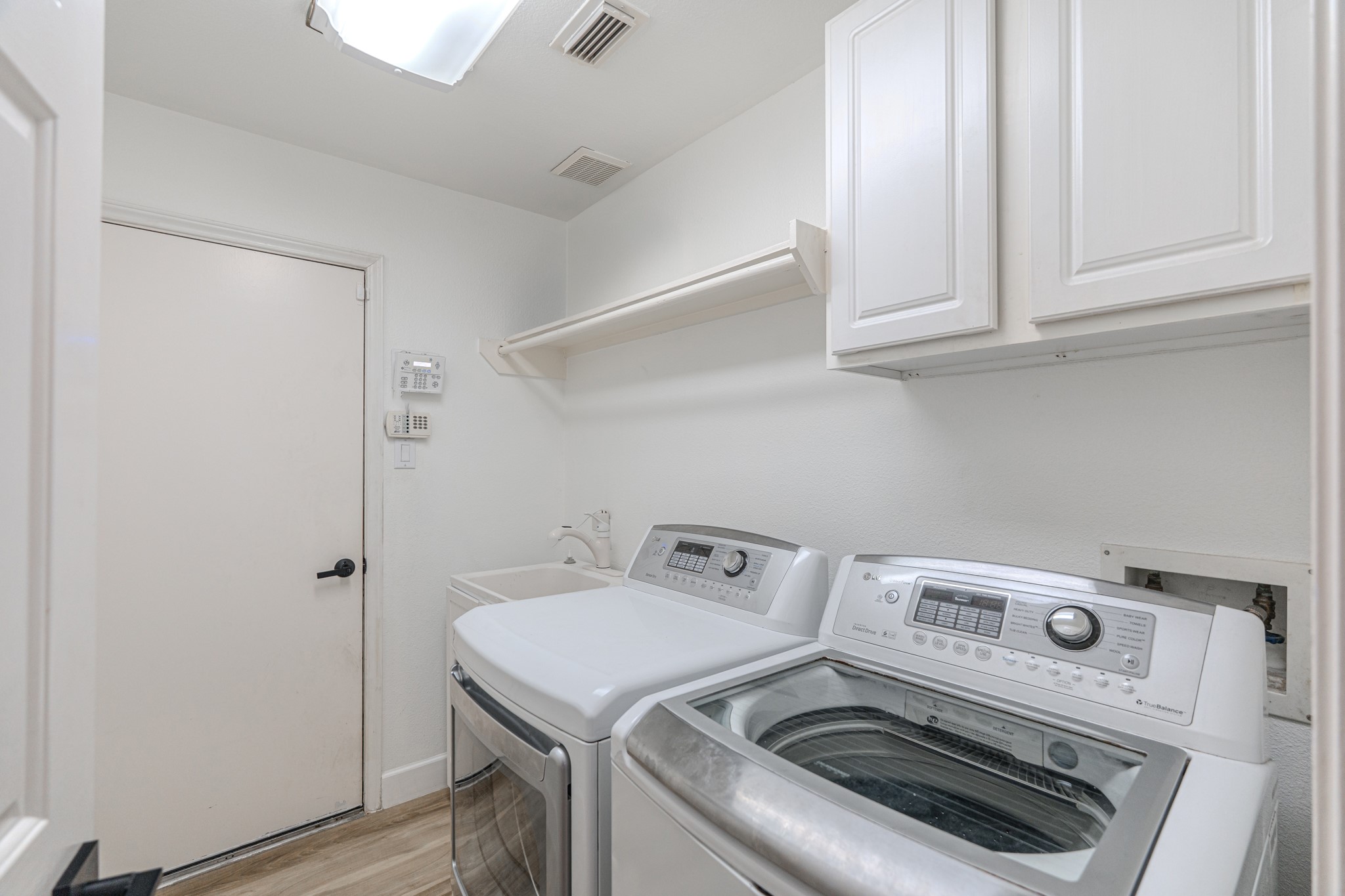 1107 Compass Cove Circle Spring, TX 77379 - Photo 38 of 42 a utility room with dryer and washer