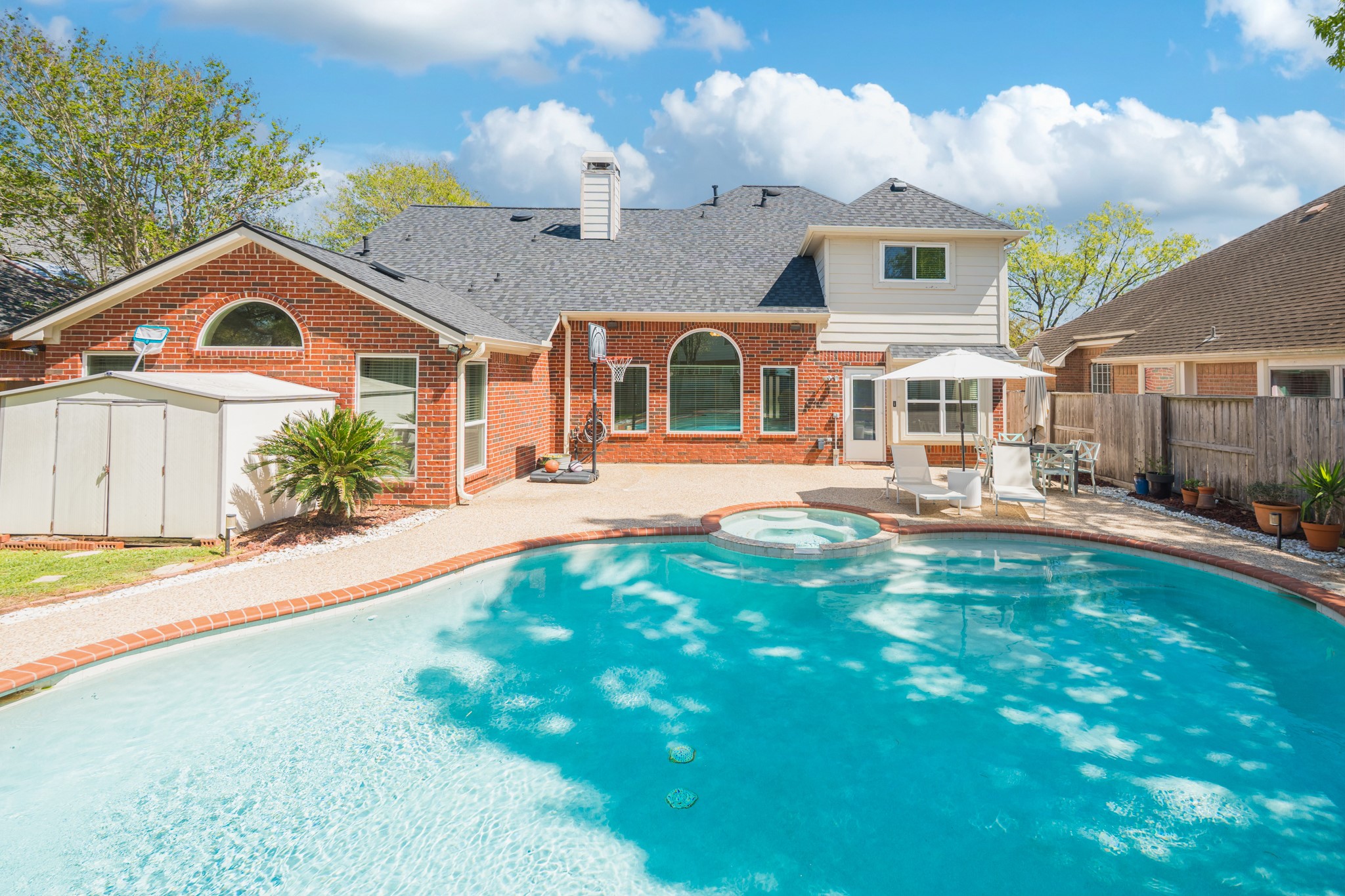 1107 Compass Cove Circle Spring, TX 77379 - Photo 39 of 42 a front view of a house with a yard