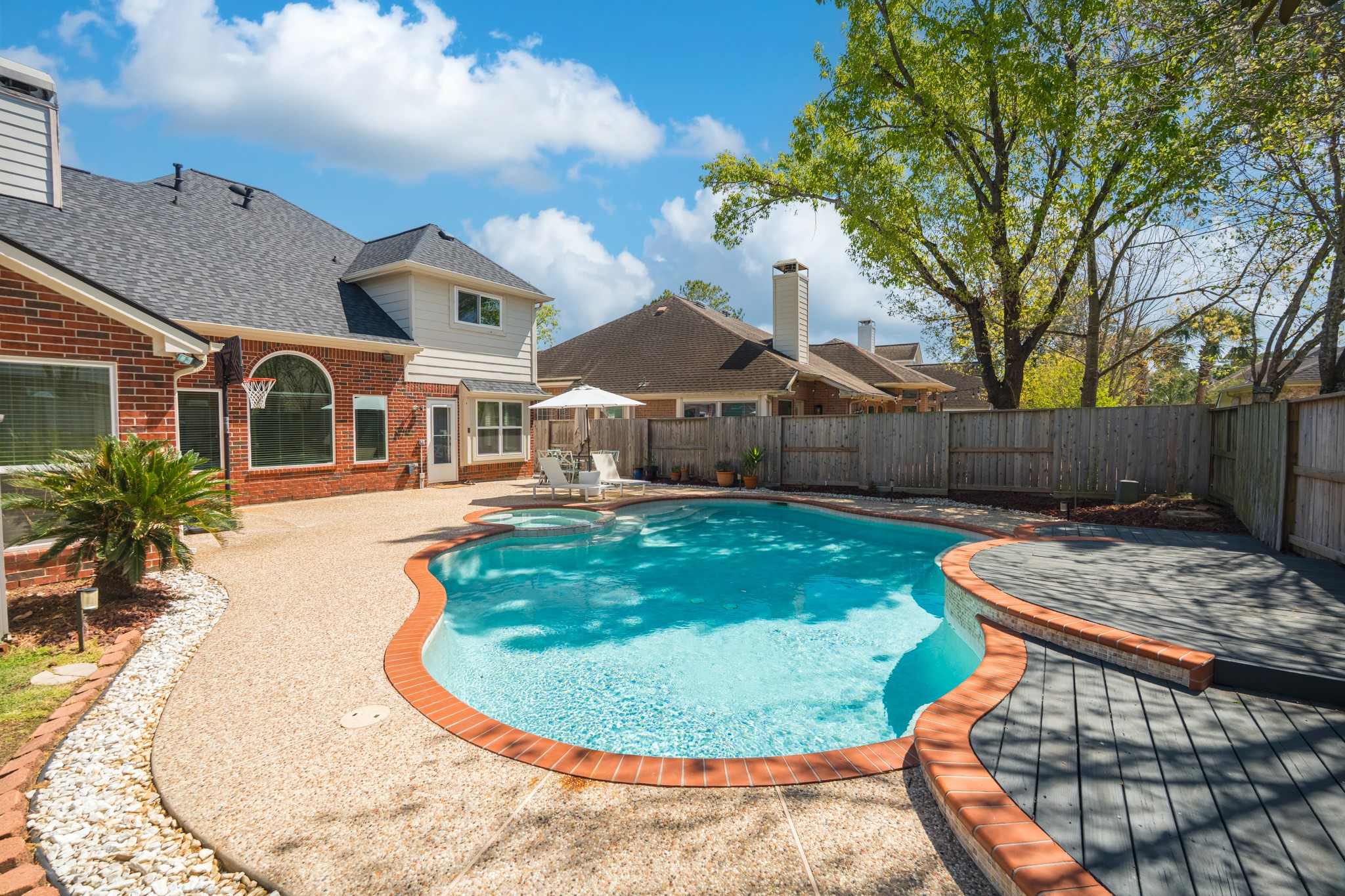 1107 Compass Cove Circle Spring, TX 77379 - Photo 40 of 42 a view of a house with swimming pool