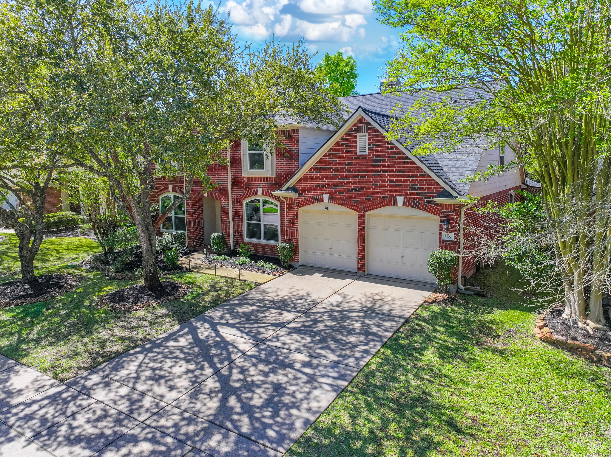 1107 Compass Cove Circle Spring, TX 77379 - Photo 42 of 42 a front view of a house with a yard