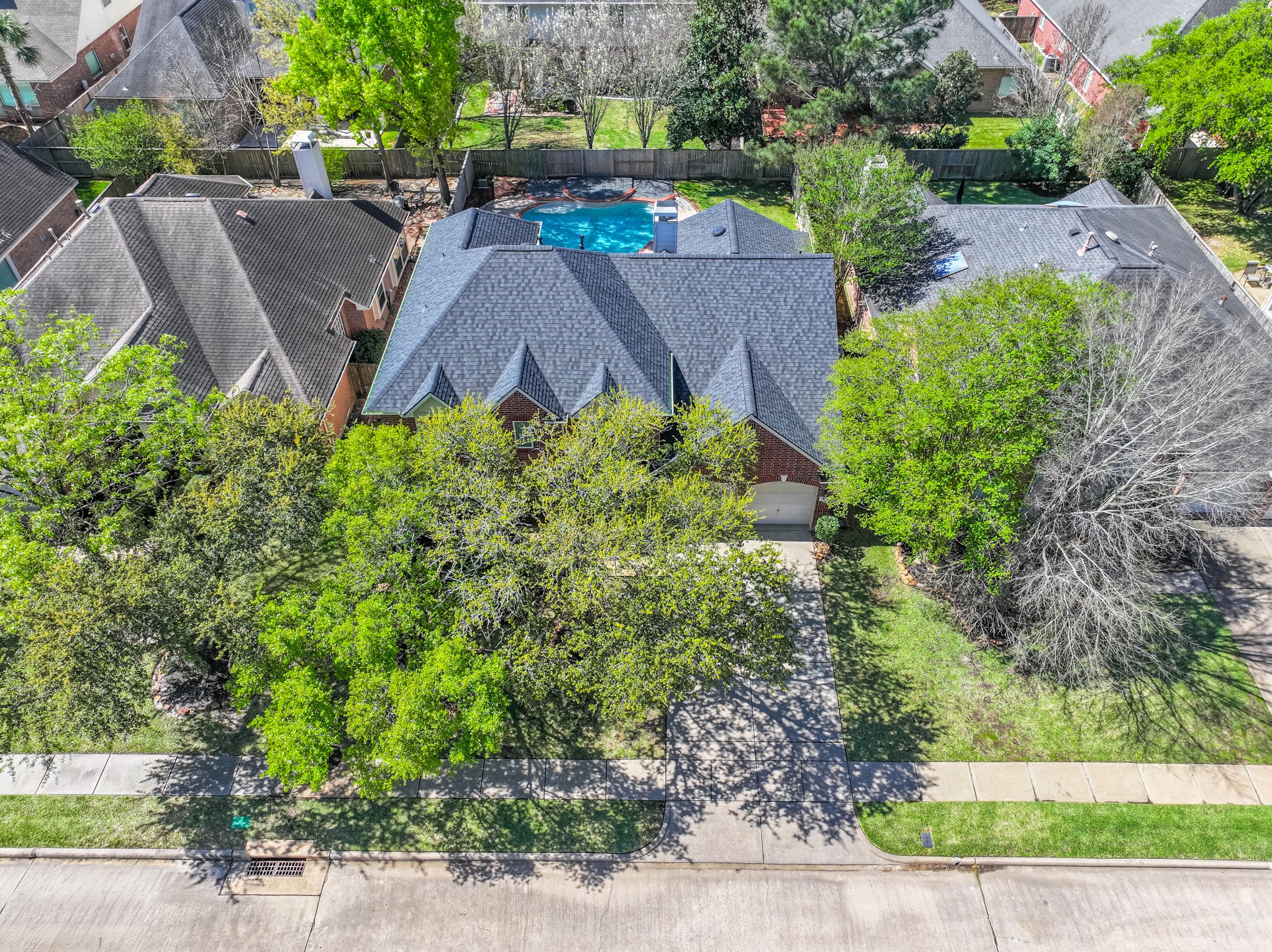 1107 Compass Cove Circle Spring, TX 77379 - Photo 5 of 42 an aerial view of a house with garden space and street view
