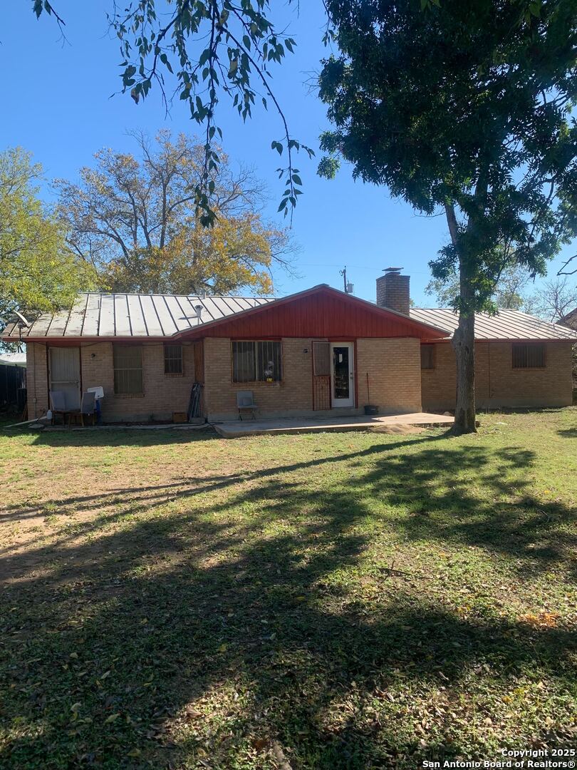 127 Roesler Road San Antonio, TX 78220 - Photo 15 of 17 a front view of a house with a yard