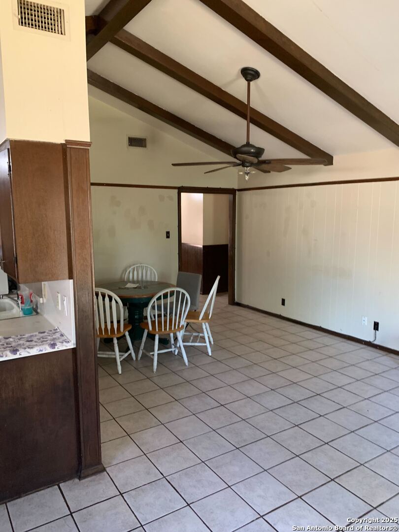 127 Roesler Road San Antonio, TX 78220 - Photo 6 of 17 a dining room with furniture and a chandelier